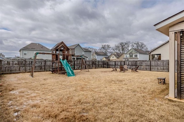 view of play area with a fire pit