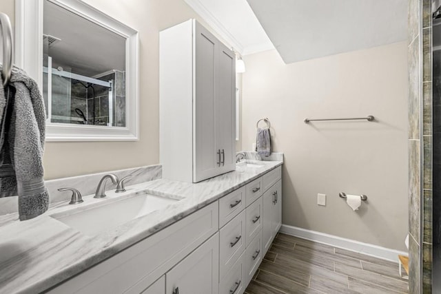 bathroom featuring vanity, a shower with shower door, and hardwood / wood-style flooring