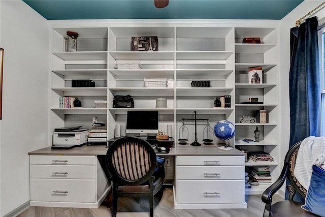 127 Bradshaw Park Dr, Woodstock, GA 30188 - home office featuring built in desk and light wood finished floors
