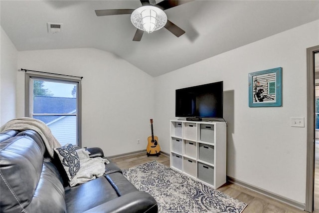 127 Bradshaw Park Dr, Woodstock, GA 30188 - living area with lofted ceiling, ceiling fan, and light wood-style flooring