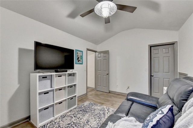 127 Bradshaw Park Dr, Woodstock, GA 30188 - living area featuring vaulted ceiling, ceiling fan, and light wood-type flooring