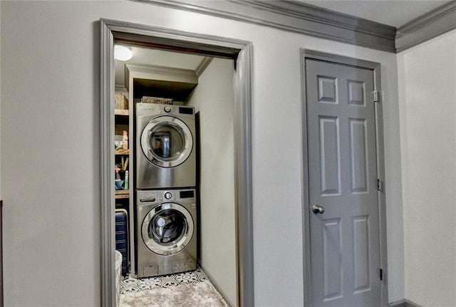 127 Bradshaw Park Dr, Woodstock, GA 30188 - washroom featuring estacked washer and dryer and ornamental molding