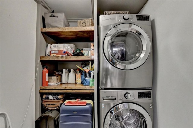 127 Bradshaw Park Dr, Woodstock, GA 30188 - laundry area featuring stacked washer / drying machine