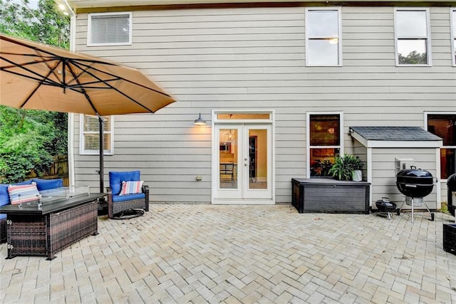 127 Bradshaw Park Dr, Woodstock, GA 30188 - view of patio featuring french doors, an outdoor living space, and a grill