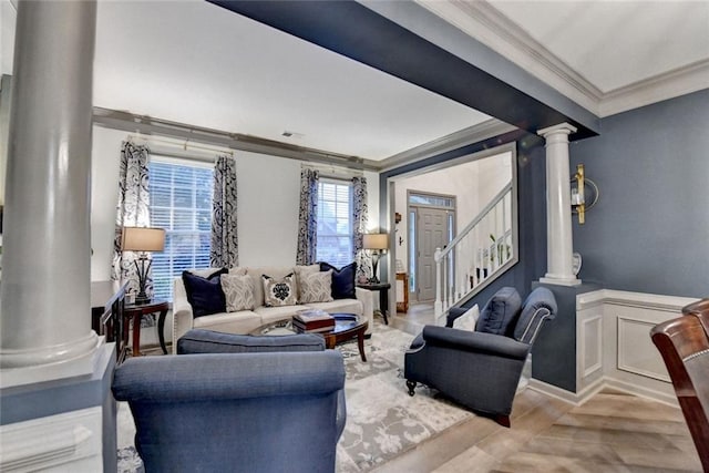 127 Bradshaw Park Dr, Woodstock, GA 30188 - living room featuring decorative columns, ornamental molding, stairs, and wood finished floors
