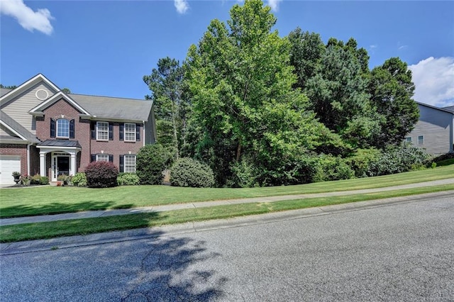 127 Bradshaw Park Dr, Woodstock, GA 30188 - view of front of property with brick siding and a front yard