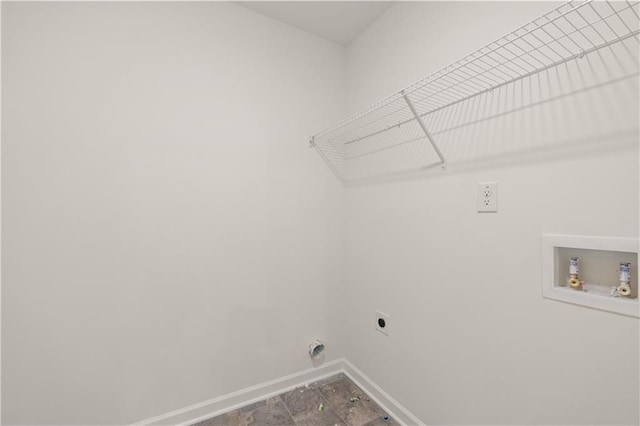 laundry area with hookup for a washing machine, baseboards, laundry area, and electric dryer hookup