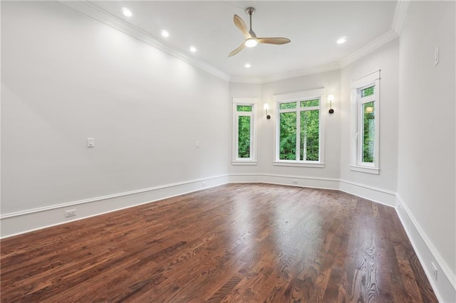 unfurnished room with baseboards, ceiling fan, wood finished floors, crown molding, and recessed lighting