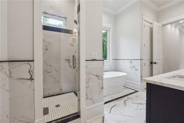 bathroom featuring marble finish floor, a soaking tub, a marble finish shower, and a wealth of natural light