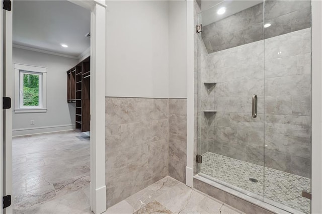 bathroom featuring ornamental molding, a stall shower, recessed lighting, and baseboards