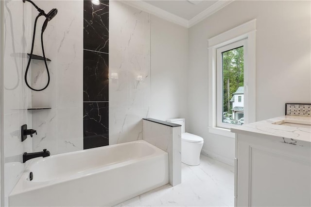 full bath featuring toilet, vanity, marble finish floor, ornamental molding, and tub / shower combination