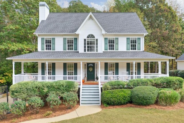 doorway to property featuring a porch