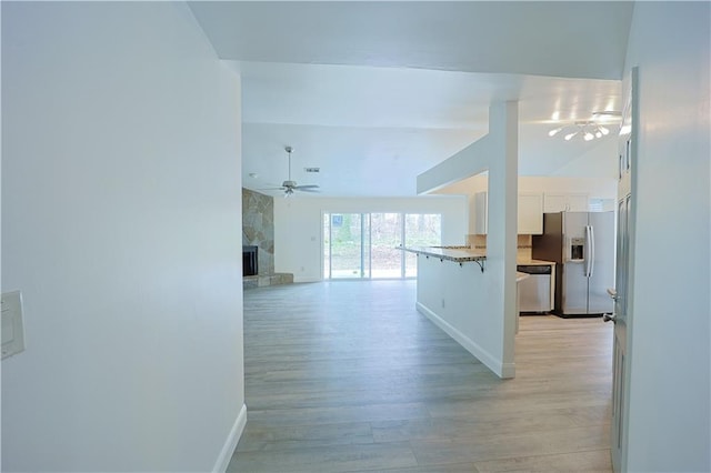 hallway featuring light wood-type flooring