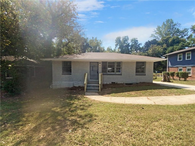 view of front of home with a front lawn