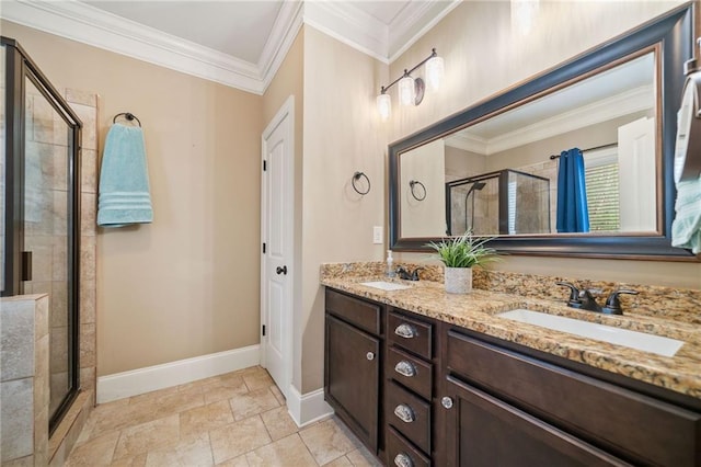 bathroom featuring ornamental molding, vanity, and a shower with shower door