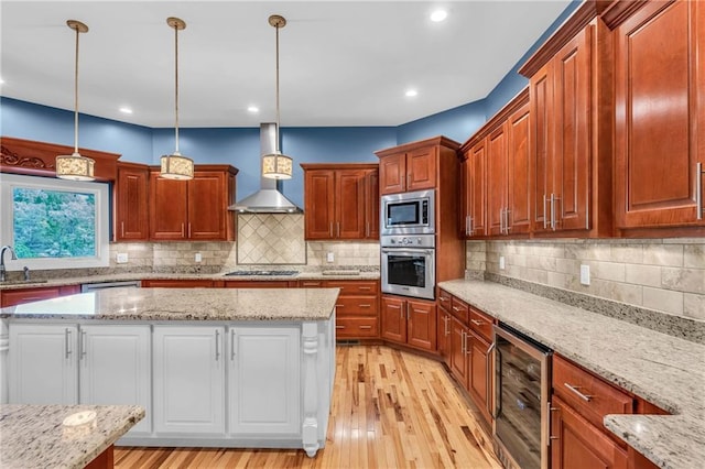 1580 Loving Rd, Morganton, GA 30560 - kitchen with wall chimney range hood, a sink, light wood-style floors, beverage cooler, and stainless steel appliances