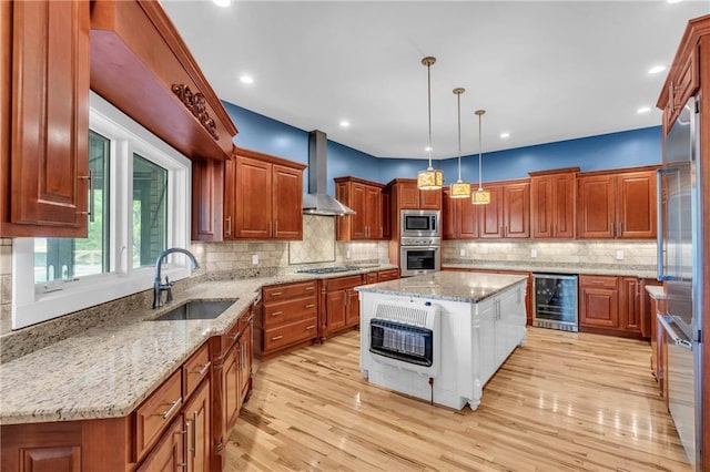 1580 Loving Rd, Morganton, GA 30560 - kitchen featuring heating unit, built in appliances, beverage cooler, wall chimney range hood, and a sink
