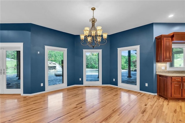 1580 Loving Rd, Morganton, GA 30560 - unfurnished dining area featuring light wood-style floors and plenty of natural light