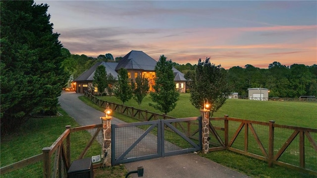 1580 Loving Rd, Morganton, GA 30560 - gate at dusk with fence and a lawn