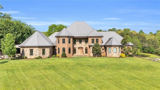 1580 Loving Rd, Morganton, GA 30560 - view of front of home featuring a front yard, fence, and stone siding