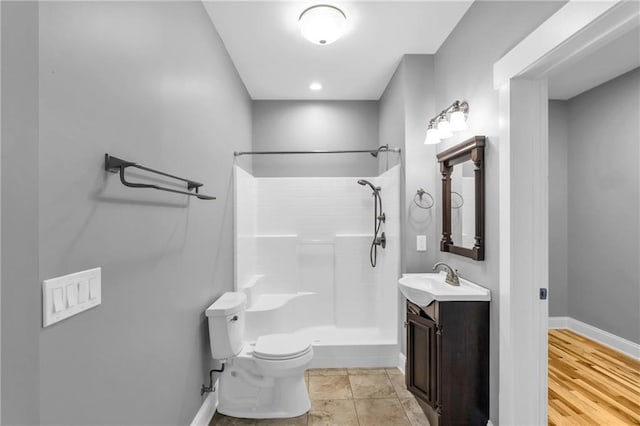 1580 Loving Rd, Morganton, GA 30560 - full bathroom featuring vanity, baseboards, walk in shower, and toilet