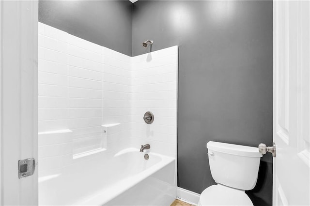 1580 Loving Rd, Morganton, GA 30560 - bathroom featuring toilet, baseboards, and bathtub / shower combination