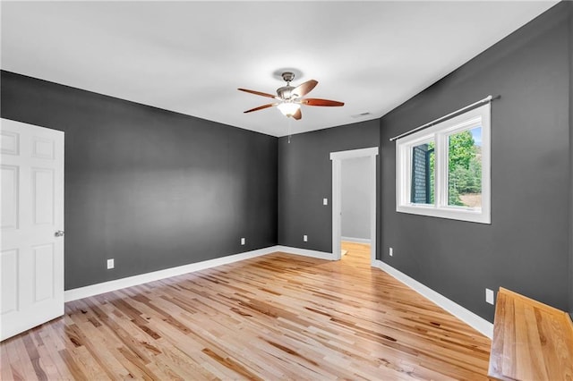 1580 Loving Rd, Morganton, GA 30560 - spare room featuring ceiling fan, baseboards, and light wood finished floors