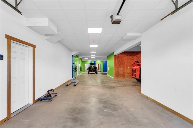 1580 Loving Rd, Morganton, GA 30560 - garage featuring baseboards and a garage door opener