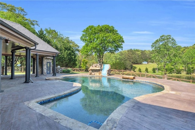 1580 Loving Rd, Morganton, GA 30560 - view of pool featuring a deck, a patio area, a fenced in pool, a fenced backyard, and a water slide