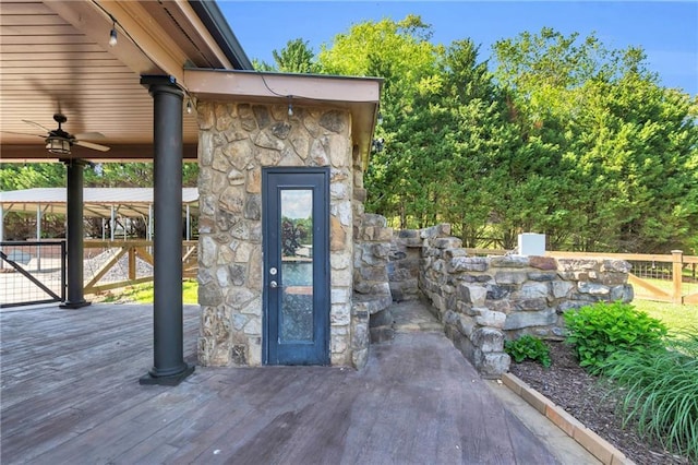 1580 Loving Rd, Morganton, GA 30560 - property entrance featuring a deck, fence, and stone siding