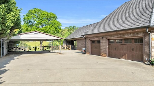 1580 Loving Rd, Morganton, GA 30560 - exterior space featuring driveway, a gate, a garage, brick siding, and fence