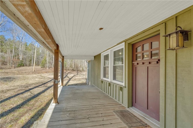 wooden deck featuring covered porch