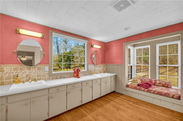 bathroom with vanity, backsplash, wood ceiling, and hardwood / wood-style floors