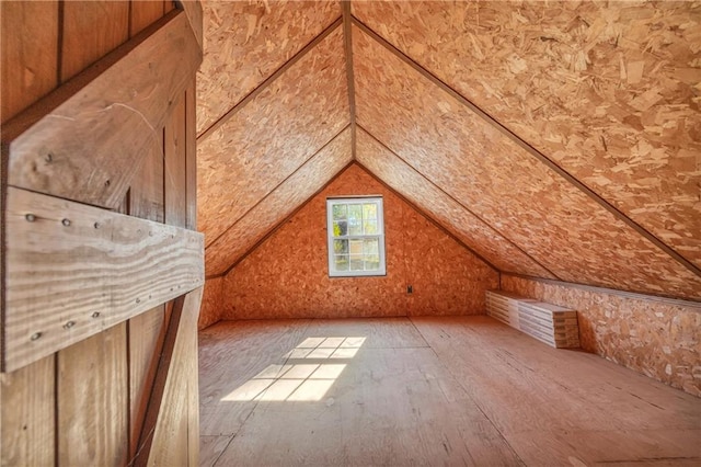 bonus room featuring lofted ceiling