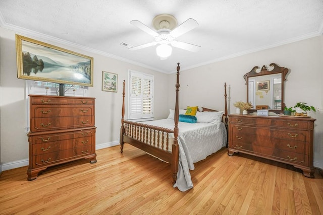 bedroom featuring ceiling fan, baseboards, crown molding, and light wood-style floors