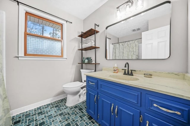 bathroom with vanity, baseboards, visible vents, curtained shower, and toilet