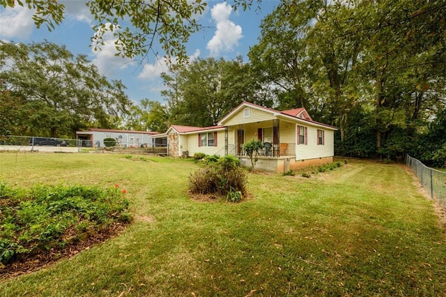 1278 Twin Pine Rd, Milledgeville, GA 31061 - view of front facade featuring covered porch, a fenced backyard, and crawl space