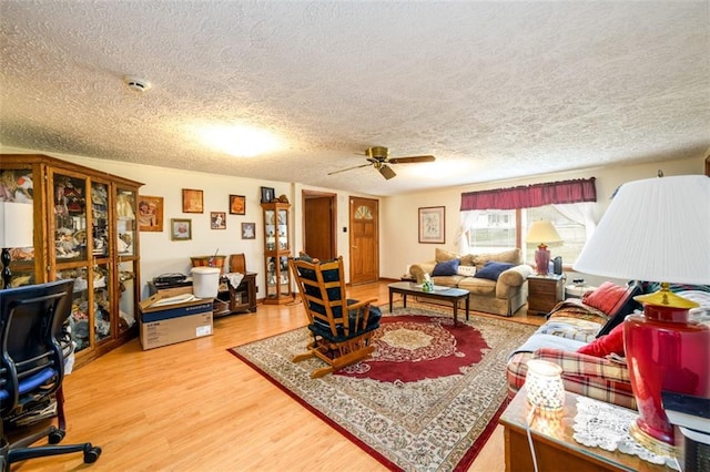 1278 Twin Pine Rd, Milledgeville, GA 31061 - living room with a textured ceiling, wood finished floors, and ceiling fan