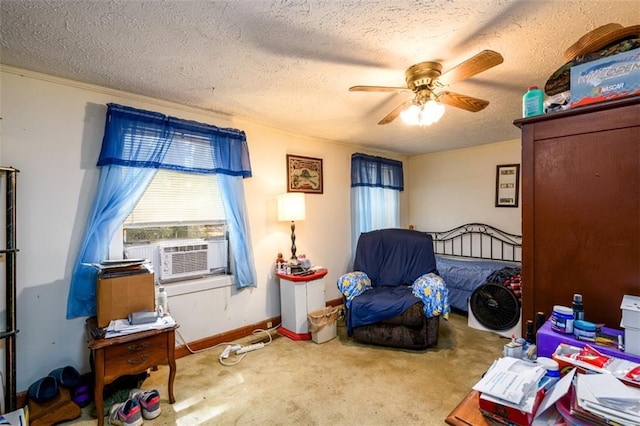 1278 Twin Pine Rd, Milledgeville, GA 31061 - bedroom featuring cooling unit, a textured ceiling, carpet floors, and a ceiling fan