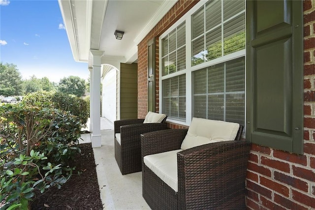 view of patio featuring a porch