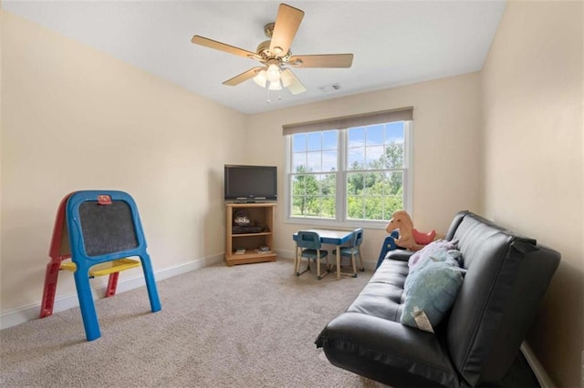 interior space with carpet and ceiling fan