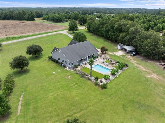 birds eye view of property with a rural view