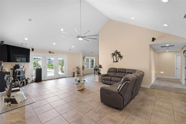 living room with ceiling fan, french doors, light tile patterned flooring, and high vaulted ceiling