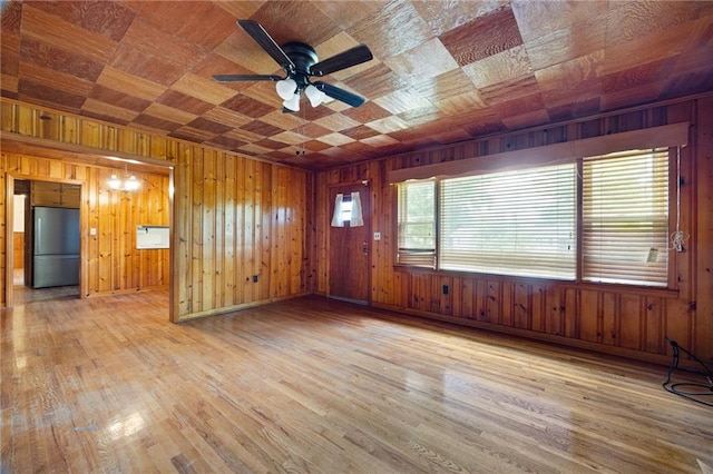 1191 S Burnt Hickory Rd, Douglasville, GA 30134 - unfurnished room featuring ceiling fan, wooden walls, and wood finished floors