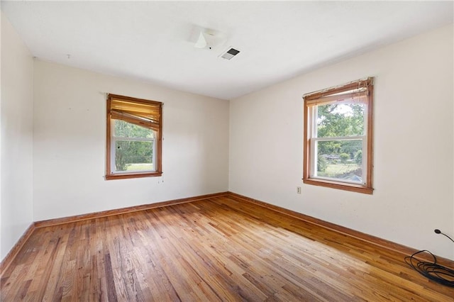 1191 S Burnt Hickory Rd, Douglasville, GA 30134 - spare room featuring hardwood / wood-style floors and baseboards
