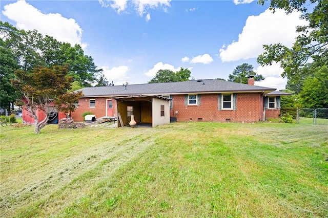 1191 S Burnt Hickory Rd, Douglasville, GA 30134 - back of property featuring crawl space, a chimney, brick siding, and a carport