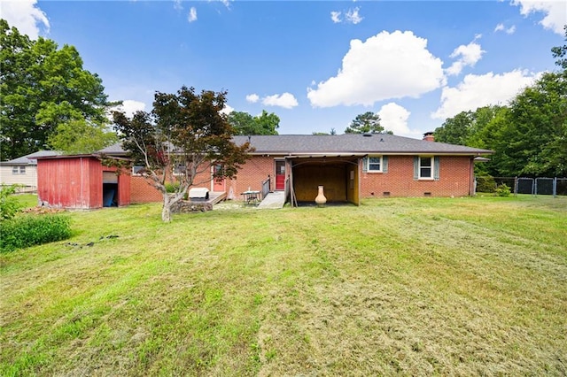 1191 S Burnt Hickory Rd, Douglasville, GA 30134 - back of property featuring a chimney, brick siding, a storage unit, and crawl space