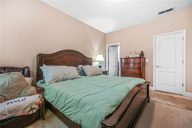 bedroom with visible vents, baseboards, and carpet floors