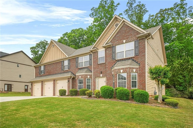 townhome / multi-family property featuring board and batten siding, an attached garage, driveway, and a front yard