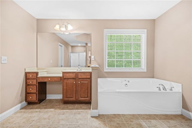 full bathroom with a bath, tile patterned flooring, walk in shower, vanity, and baseboards